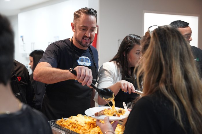 Mathew at charity food bank event